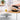 Nuovva black cast iron loaf pan with lid and non-stick enamel coating.