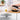 Nuovva black cast iron loaf pan with lid and non-stick enamel coating.