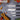 Set of 4 kitchen knives with dimensions including a slicing knife, santoku knife, utility knife and paring knife.