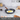 Grey marble frying pan with wooden handle.