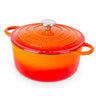 Orange cast iron Dutch oven with lid. 