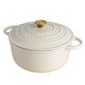 Cream cast iron casserole pot with matching lid and gold knob