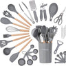 Grey silicone kitchen utensil set wiith holder hangin loop and measuring tools