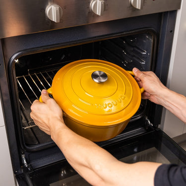 Yellow oven safe pot with lid. Cast iron casserole pot. 