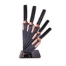 Copper kitchen knife set with acrylic block  includes utility knife, slicing knife, chef's knife, bread knife and paring knife. 