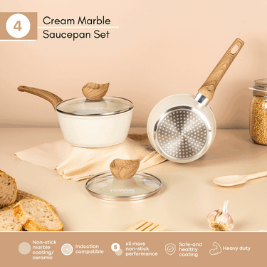 Cream marble saucepan sets for induction hob.