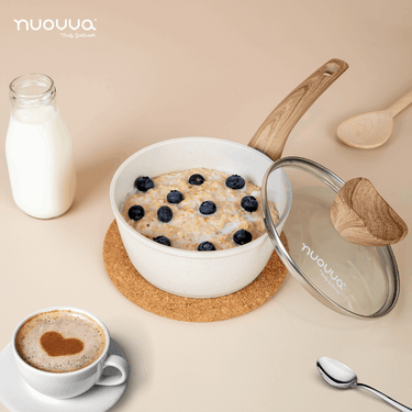 Nuovva cream saucepan with glass lids.