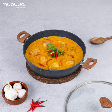 Image of nuovva marble casserole pot with wooden handle and glass lid. 