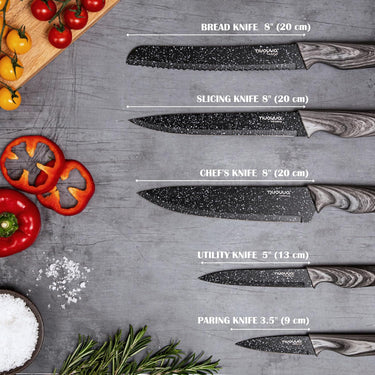 Granite kitchen knife set including utility knife, slicing knife, chef's knife, bread knife and paring knife. 