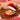 Red cast iron bread pot with lid. Enamelled cookware for stove to oven cooking. 
