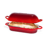 Red enameled cast iron bread loaf pan with self-basting lid for sourdough bakery. 